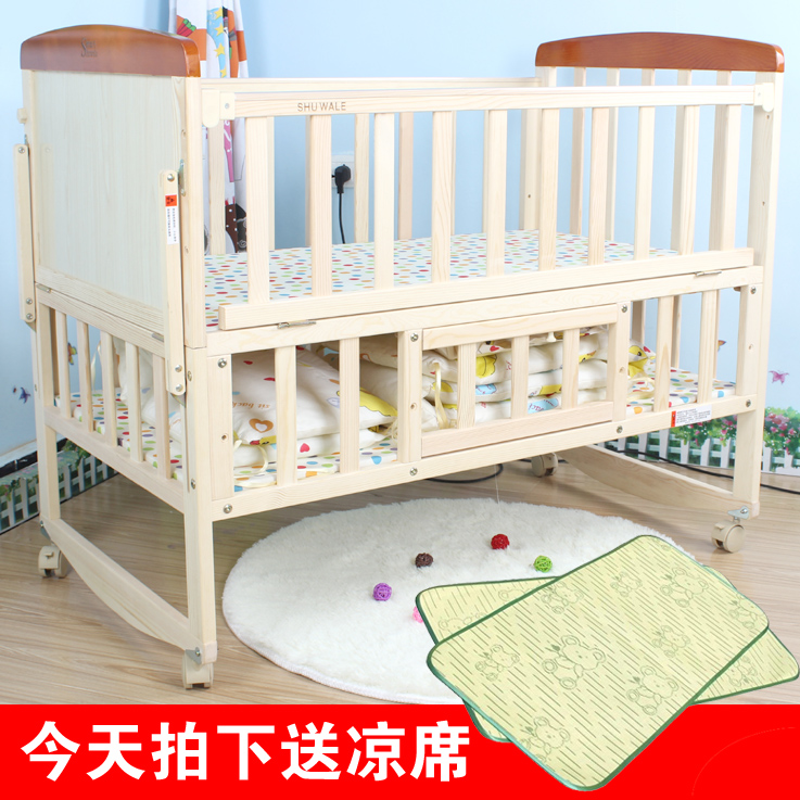 婴儿床实木无漆宝宝床摇篮床可变书桌bb床童床游戏床包邮送蚊帐